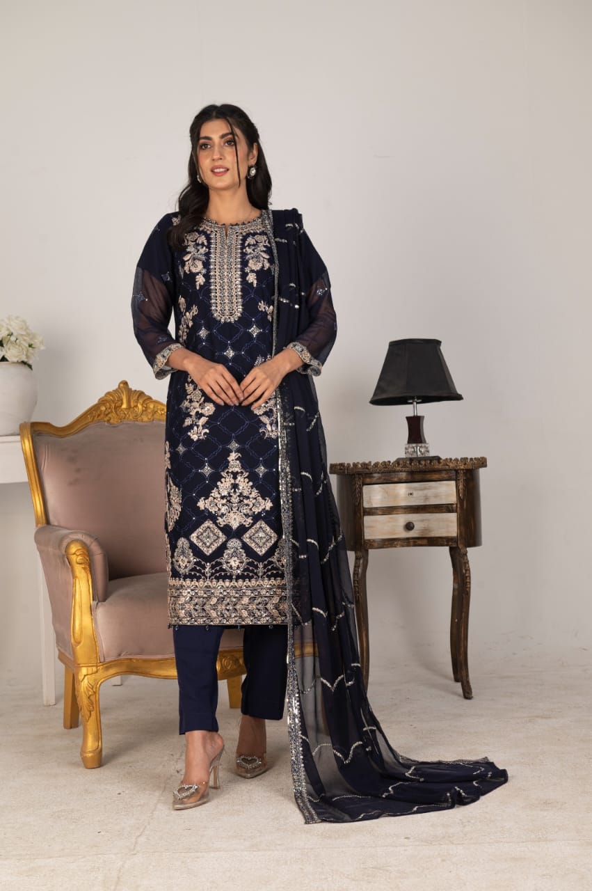 Embroidered chiffon dupatta draped over shoulder