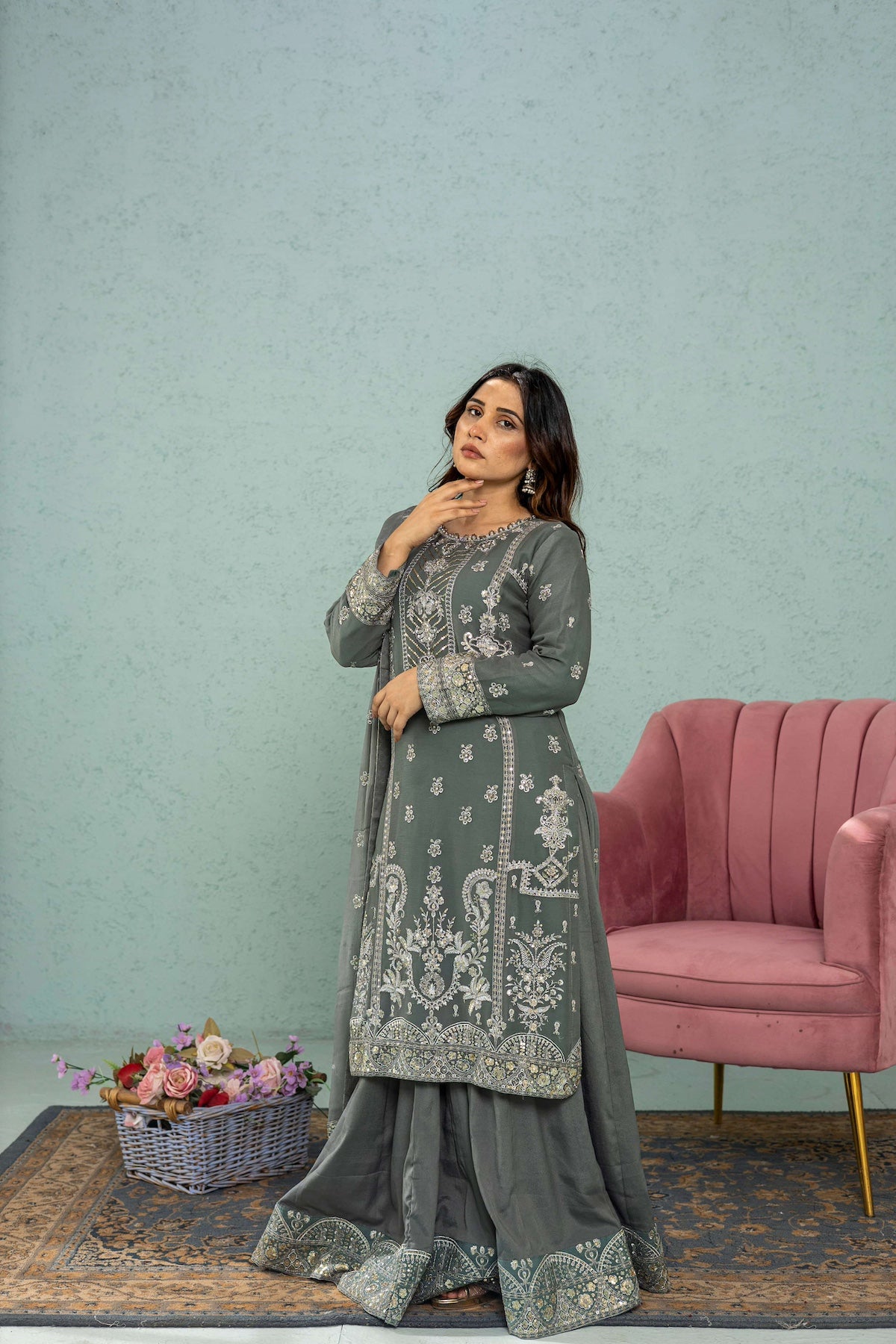 Model posing in gray lehnga set