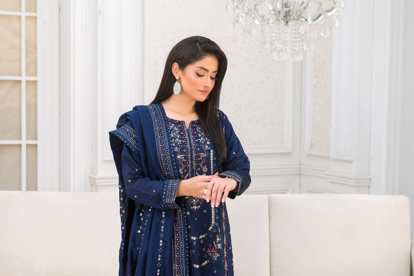 Navy Blue Raw Silk Shalwar Kameez with Multicolor Embroidery Close Embroidery
Picture Action