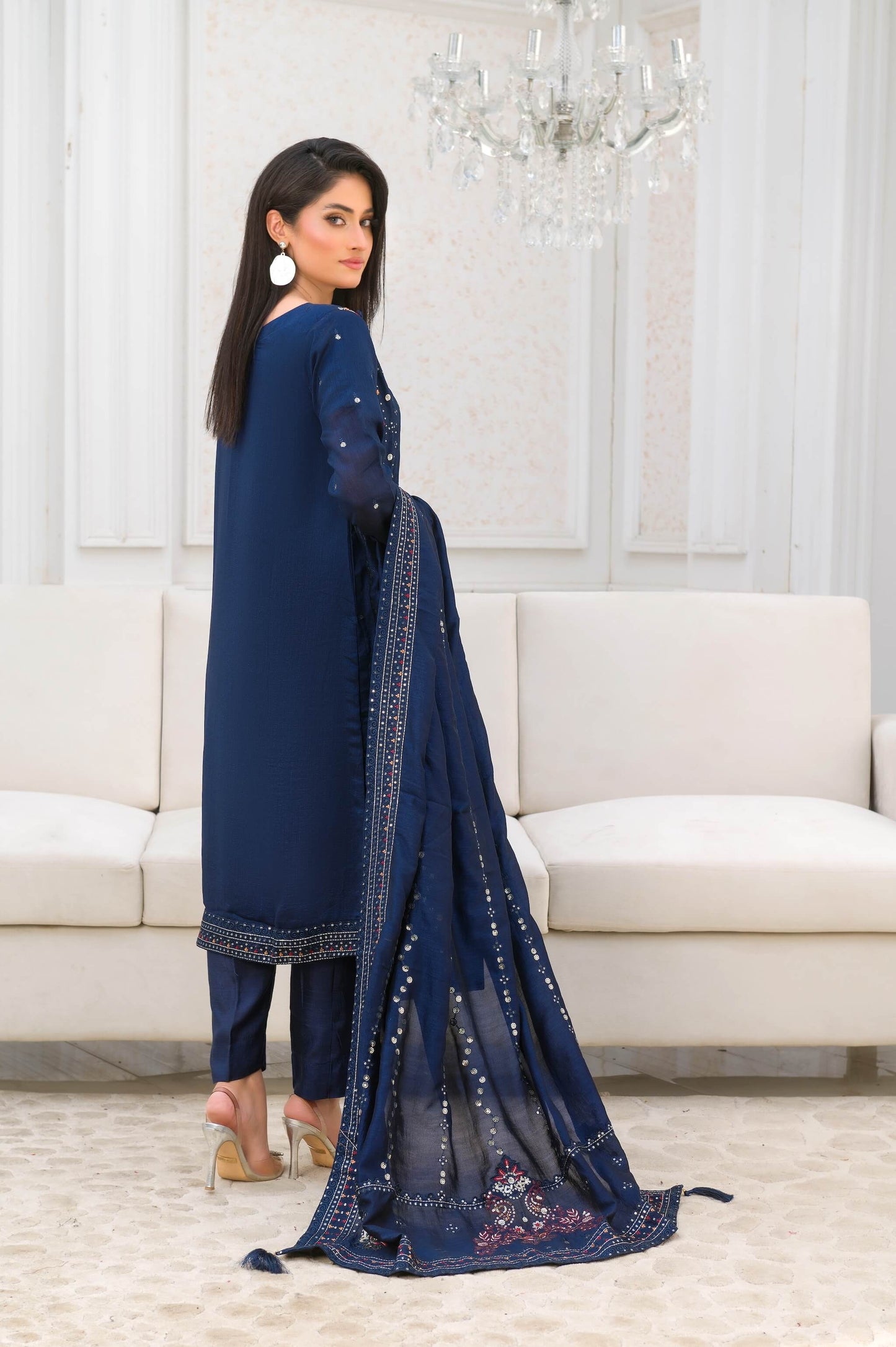 Navy Blue Raw Silk Shalwar Kameez with Multicolor Embroidery Back
Picture