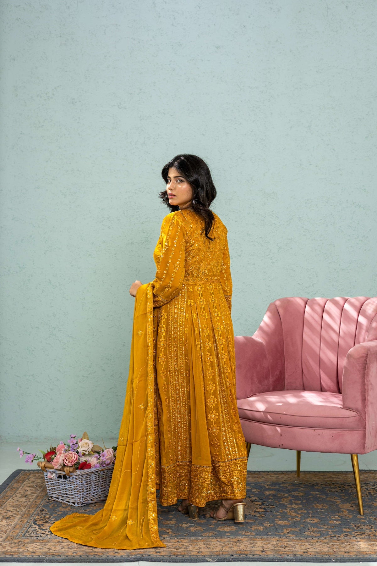 Side profile of Anarkali frock in mustard