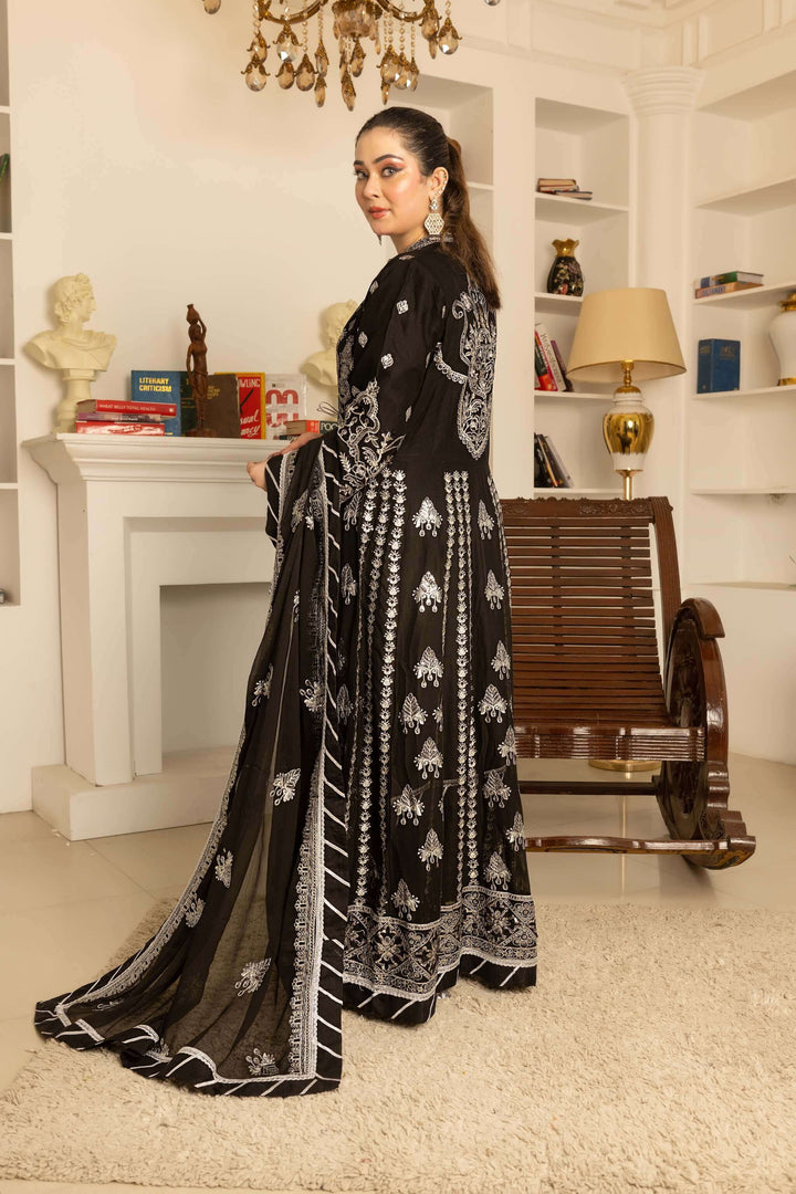 Back design of black chiffon Anarkali suit with coat style