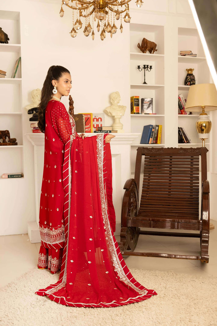 Video of model wearing red lehenga with heavy embroidery for weddings and festive events