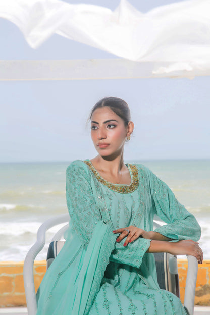 Close-up of hand embroidery on light blue gown