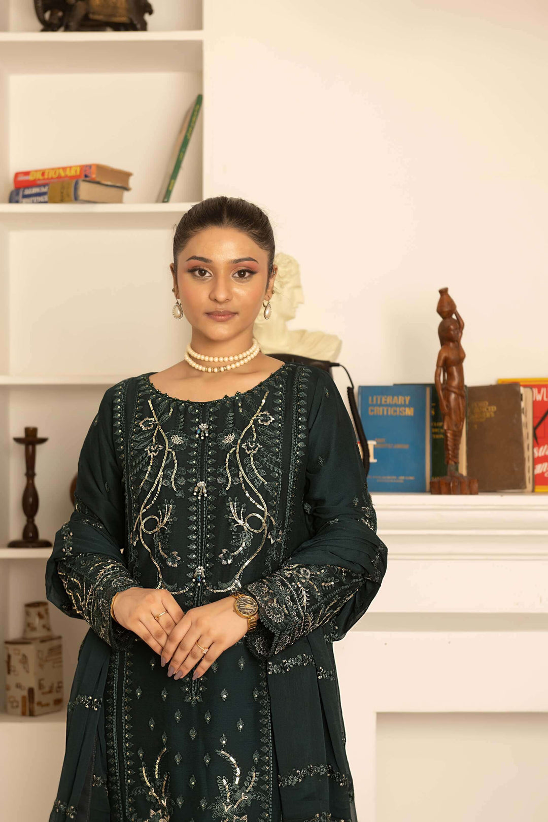 Heavy embroidery detail on bottle green chiffon kameez and dupatta