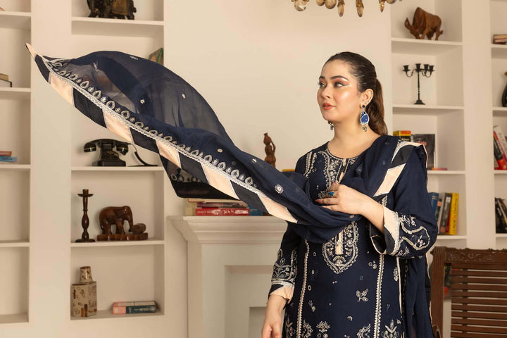 Detail of navy blue chiffon fabric and palazzo style flapper trouser with sleeves