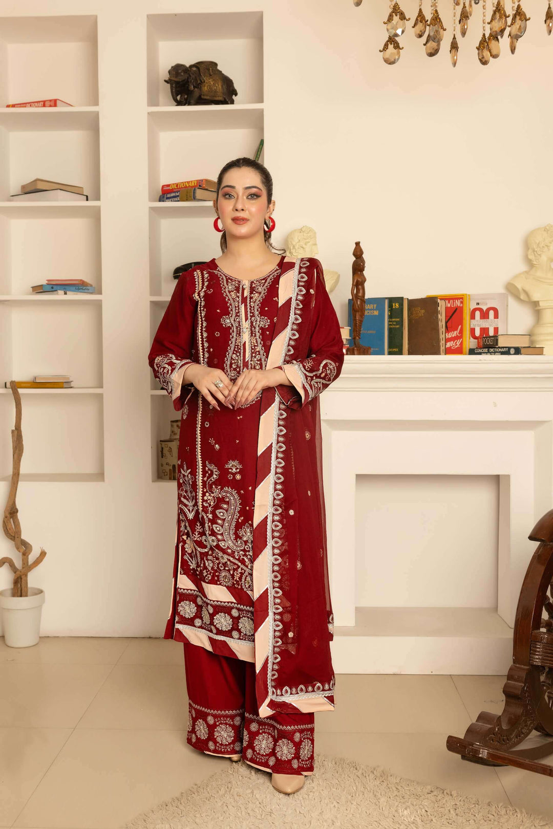Front view of maroon chiffon kameez with flapper-style palazzo trouser partywear suit