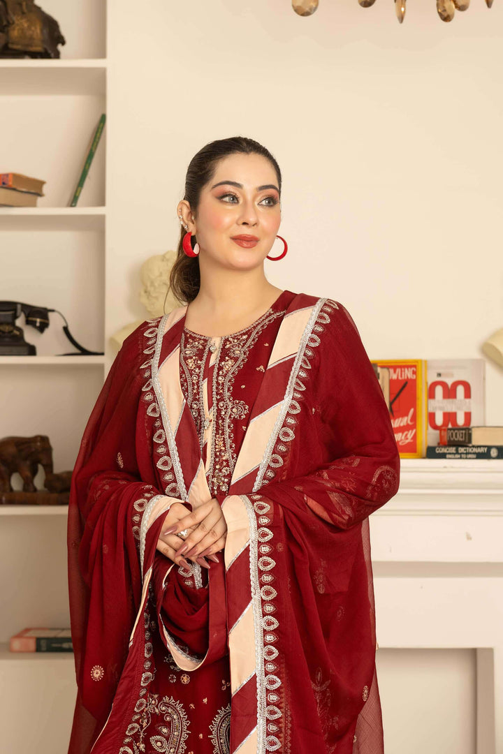 Fabric detail of maroon chiffon kameez with flapper-style palazzo trouser