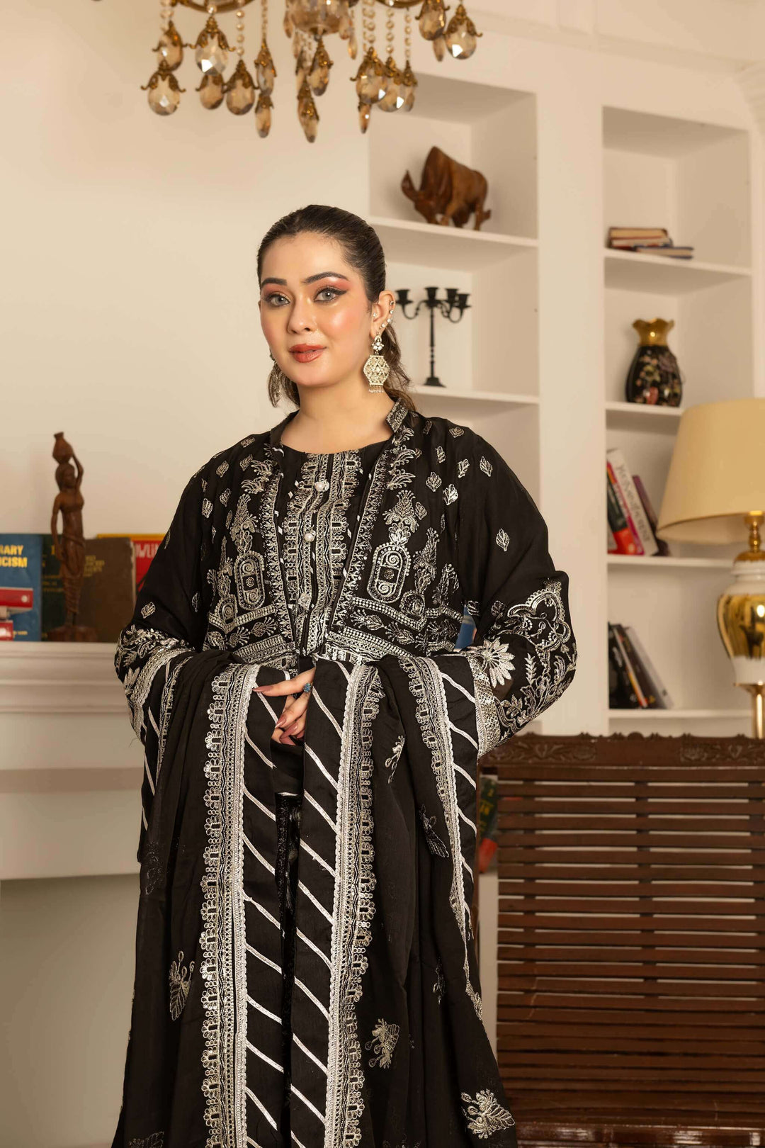 Front view of black chiffon Anarkali coat front open suit on model