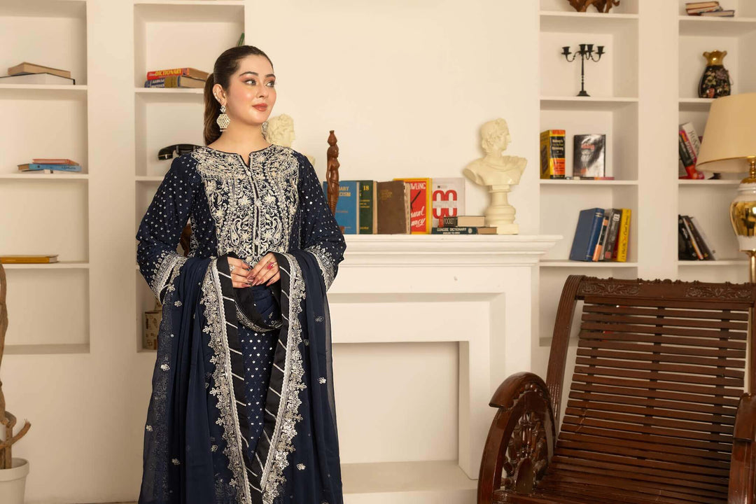 Front view with angle of navy blue lehenga with heavy embroidery and handwork for wedding wear