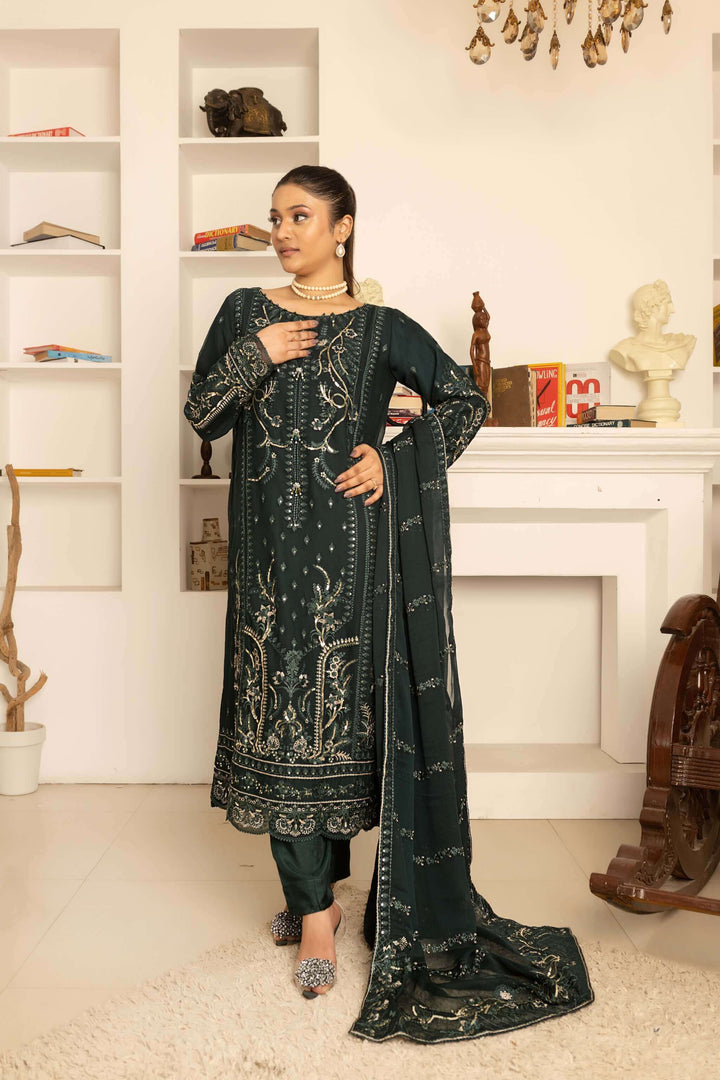 Front view of bottle green chiffon shalwar kameez with heavy embroidery Action with dup