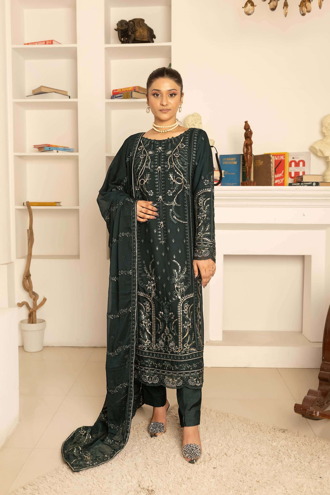 Front view of bottle green chiffon shalwar kameez with heavy embroidery and dupatta