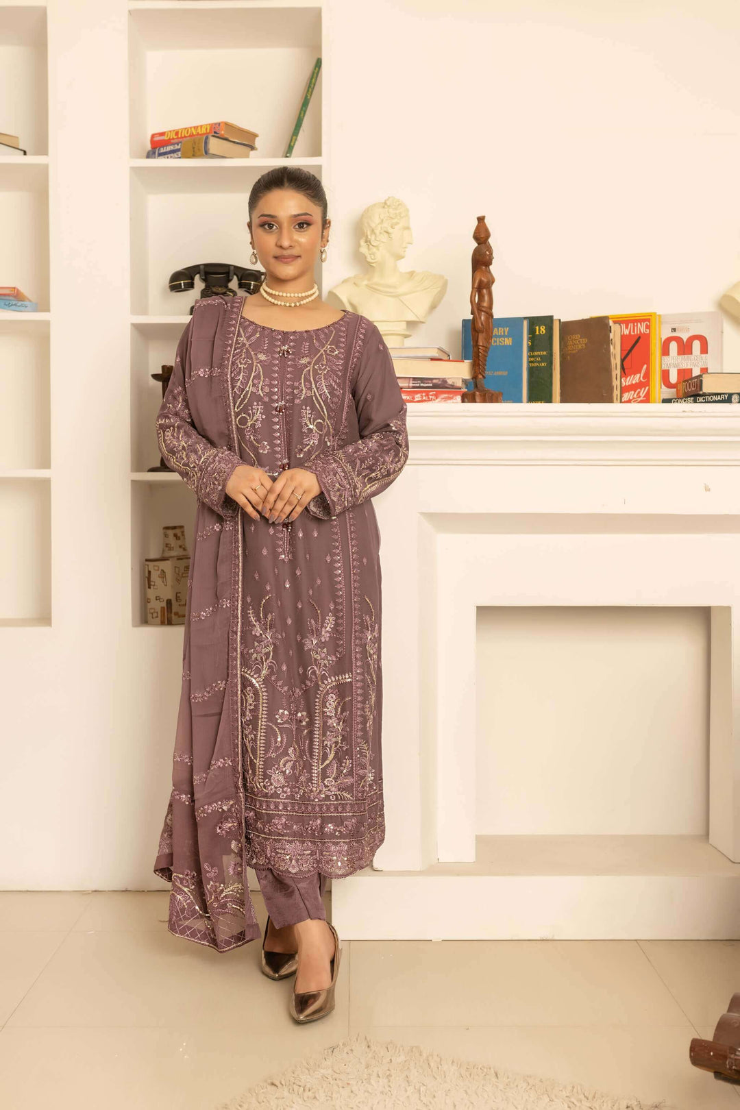Front view of mauve chiffon shalwar kameez with heavy embroidery partywear suit