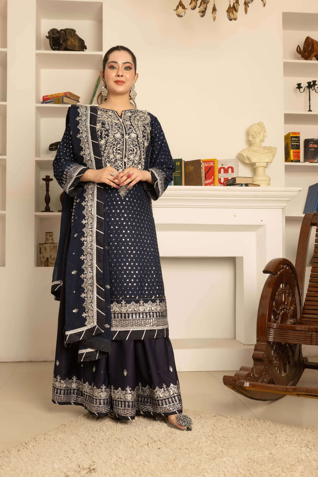 Front view of navy blue lehenga with heavy embroidery and handwork for wedding wear