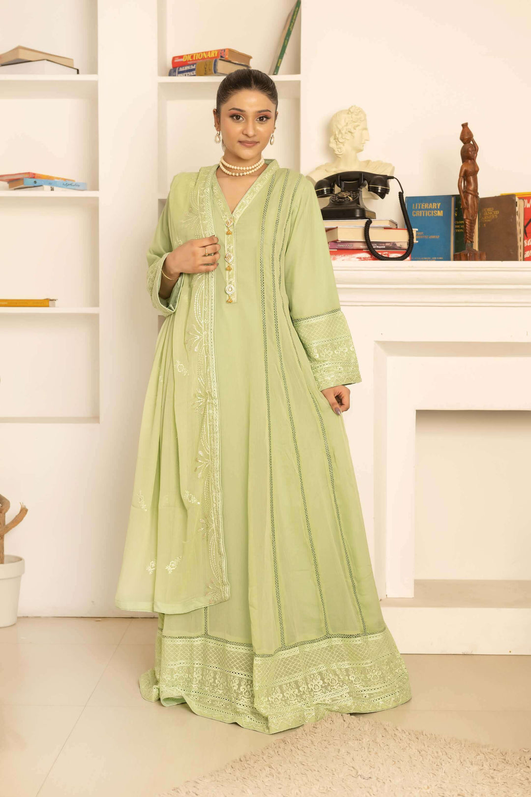 Front view of sophisticated pista green chiffon Anarkali maxi dress on model