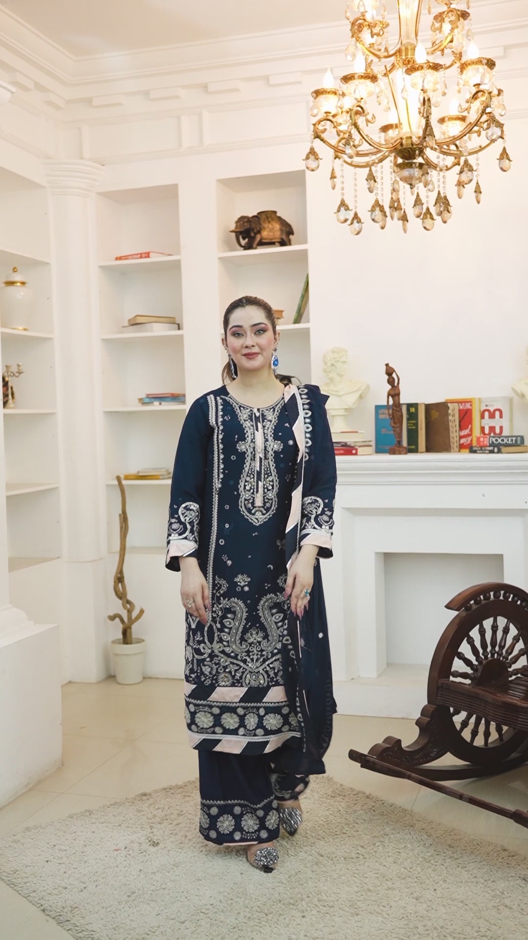 Video of model showcasing navy blue chiffon kameez with flapper-style trouser for weddings and parties