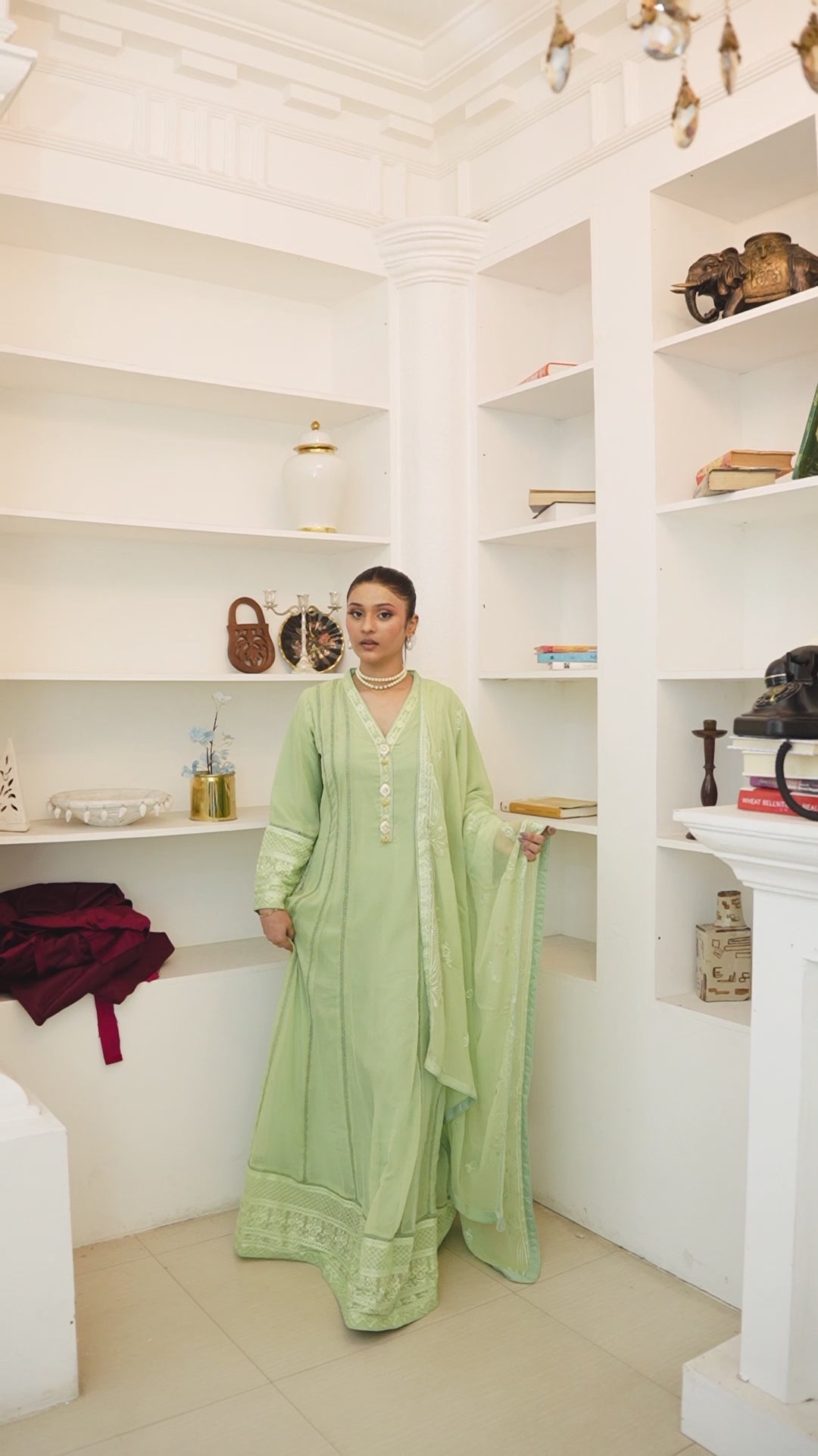 Video of model showcasing pista green chiffon Anarkali maxi dress front and back