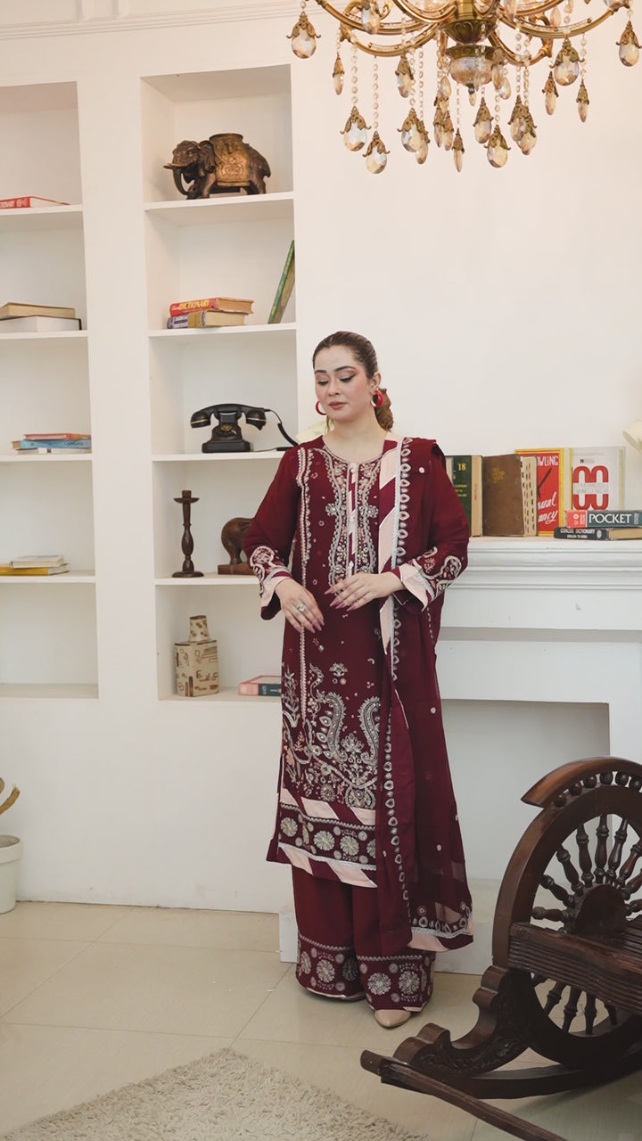 Video of model wearing maroon chiffon kameez with flapper trouser for weddings and festive occasions