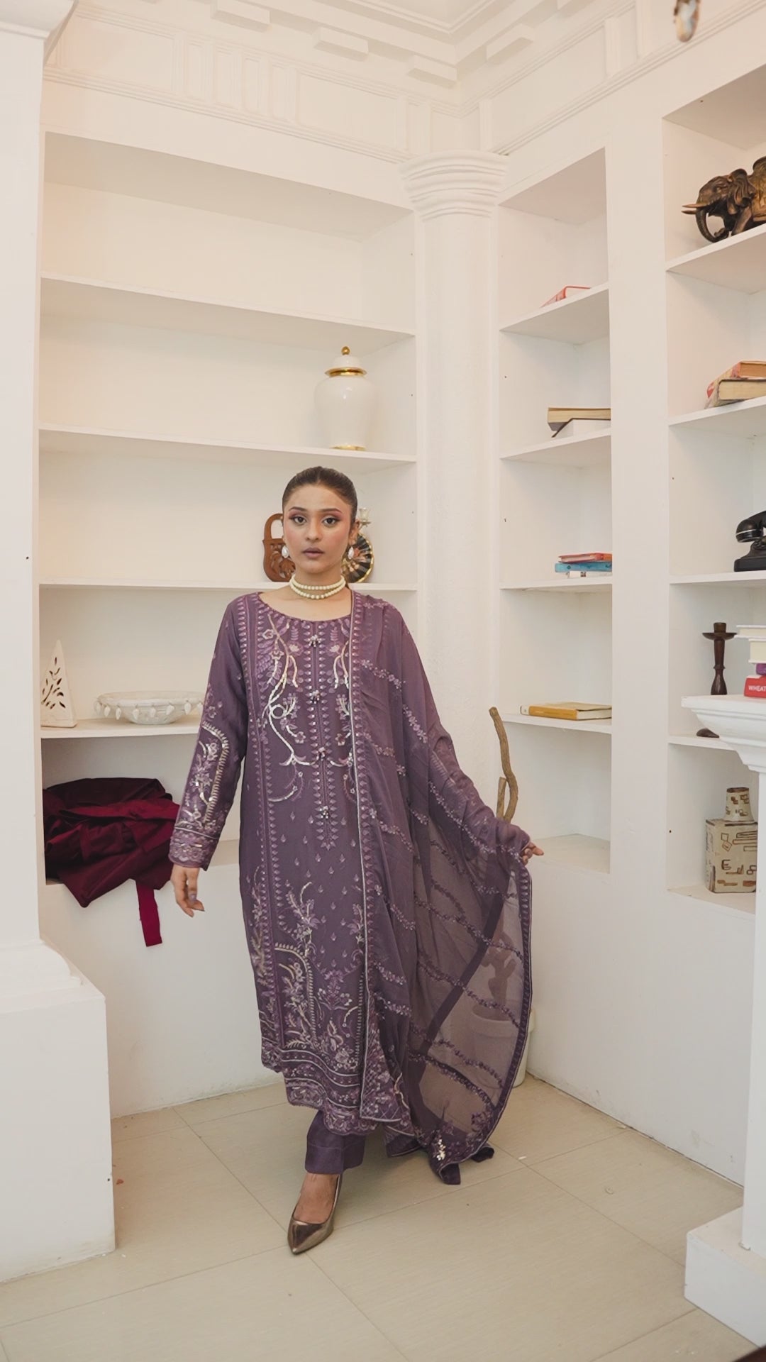 Video of model wearing mauve chiffon shalwar kameez with heavy embroidery for wedding & festive wear