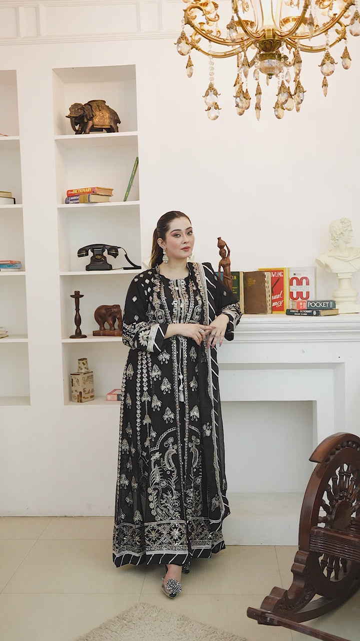 Video of model showcasing front, back, and side view of black chiffon Anarkali coat