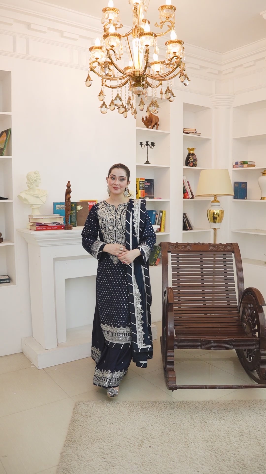 Video of model wearing navy blue lehenga with embroidery and handwork for partywear and weddings