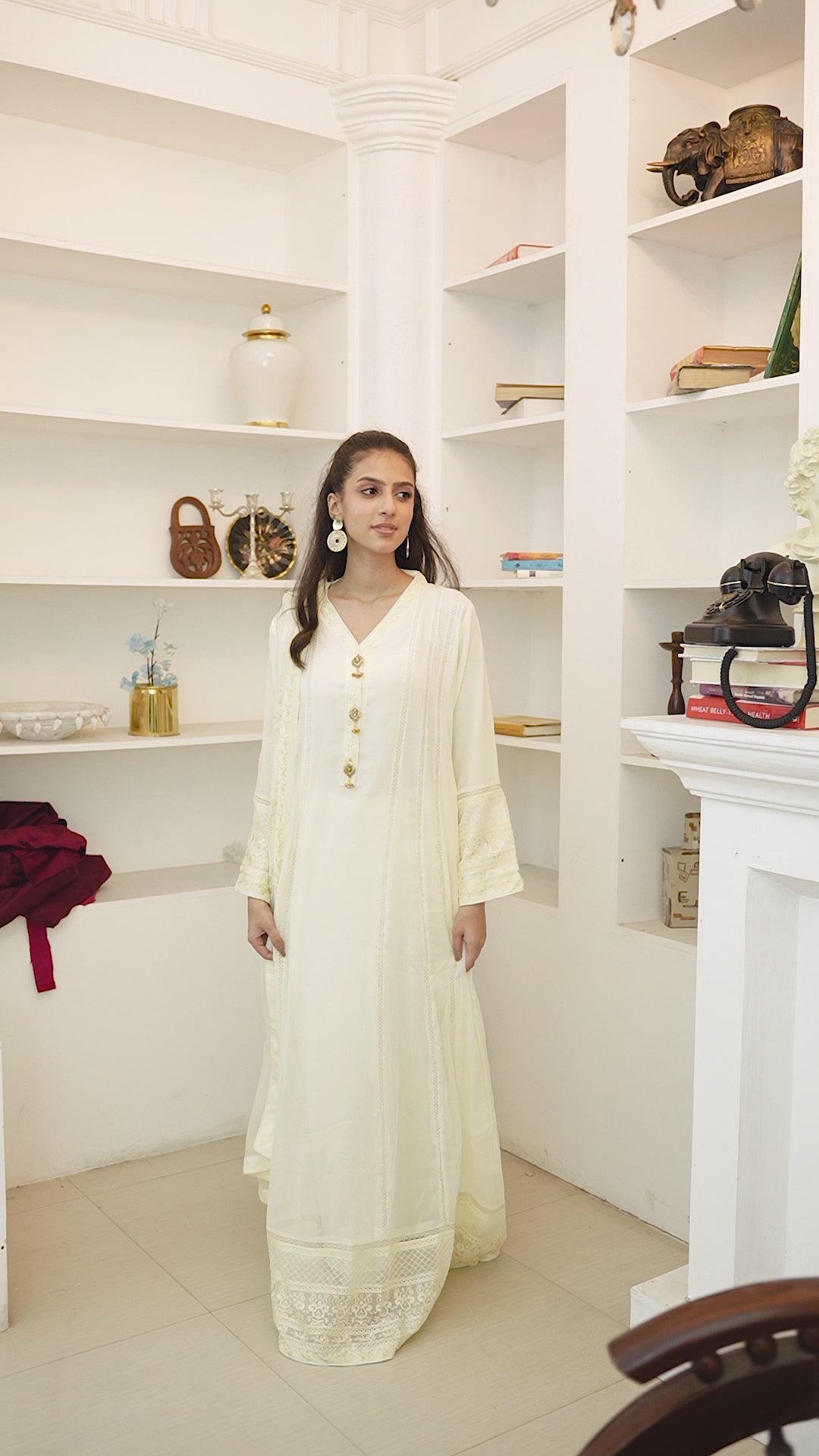 Video of model wearing ivory chiffon sophisticated Anarkali maxi dress showing front and back