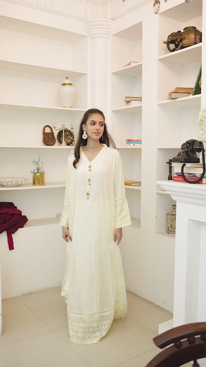 Video of model wearing ivory chiffon sophisticated Anarkali maxi dress showing front and back